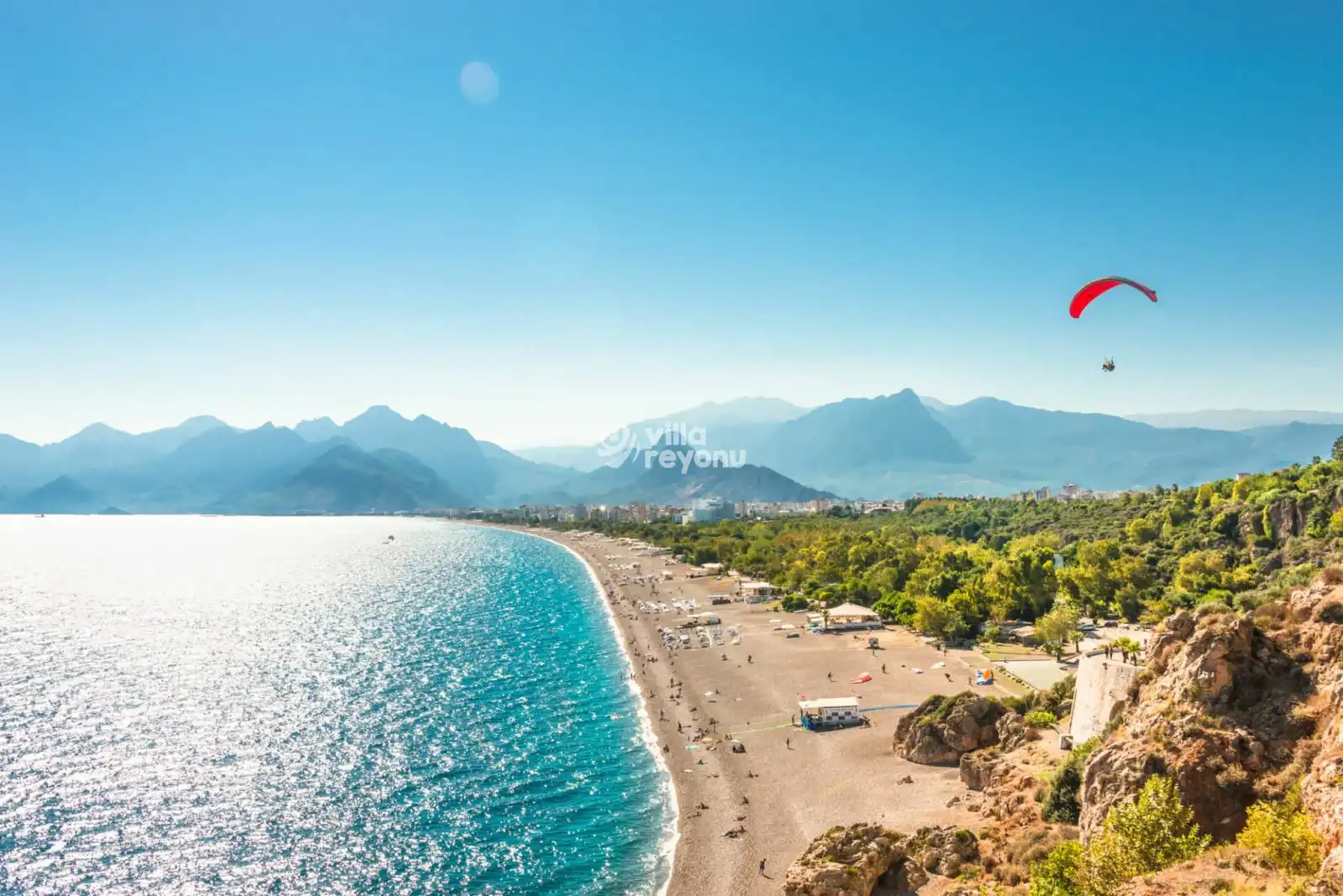 a beach and paragliding in Antalya